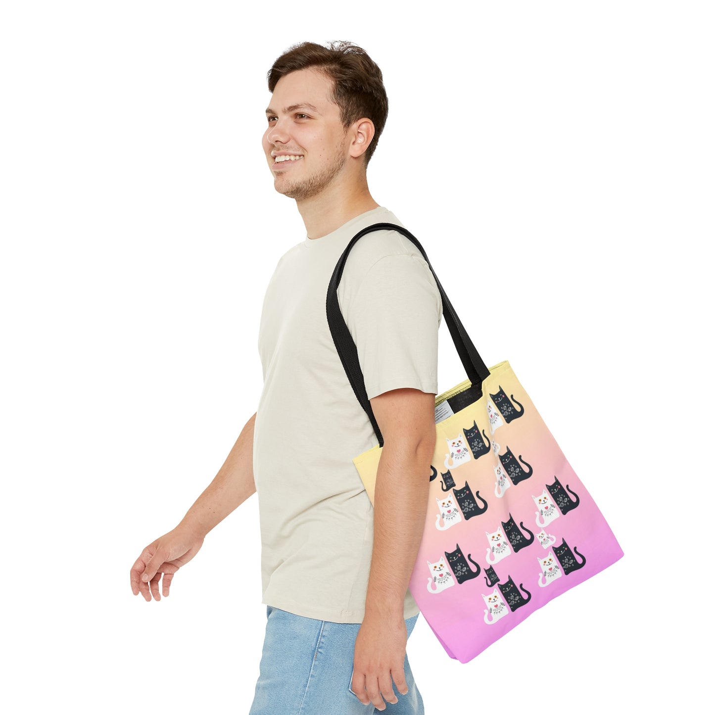 Black and White Cartoon cats design on a pink and yellow colored tote bag