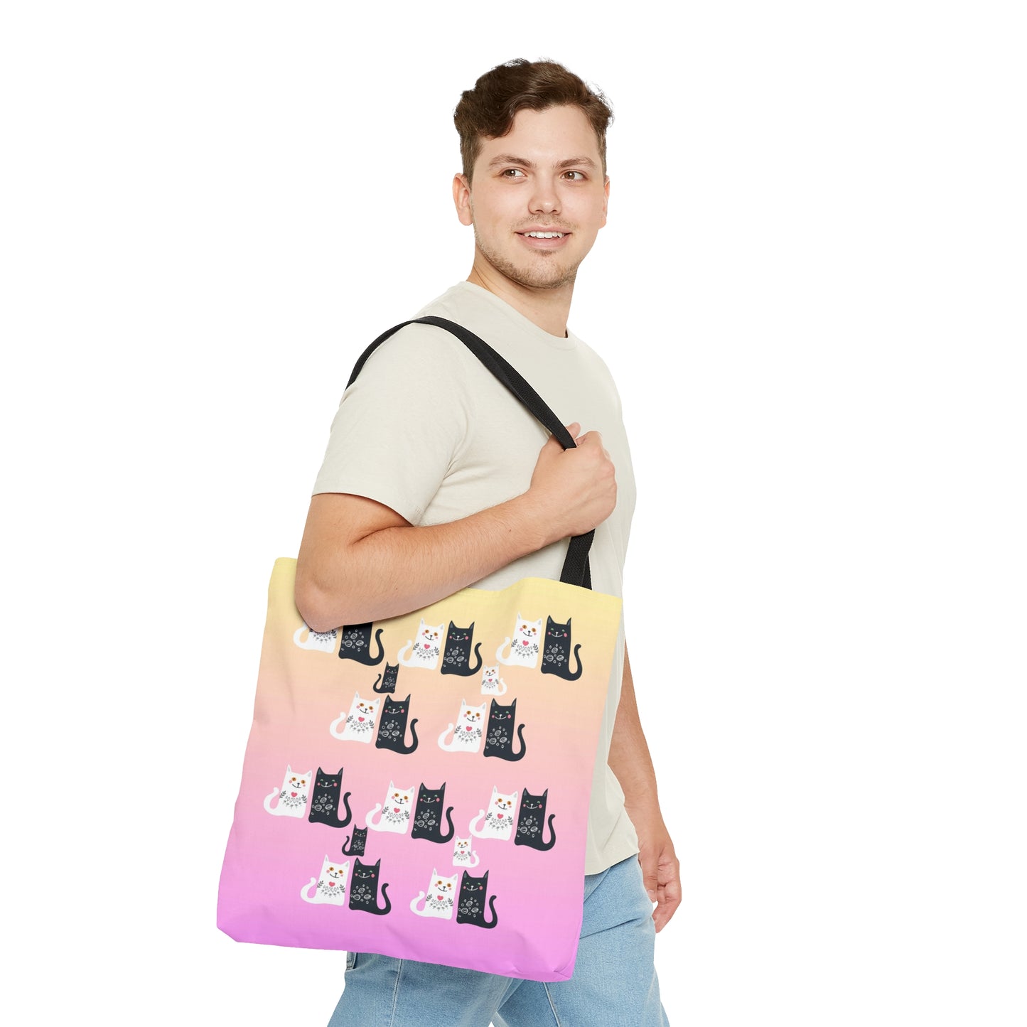 Black and White Cartoon cats design on a pink and yellow colored tote bag