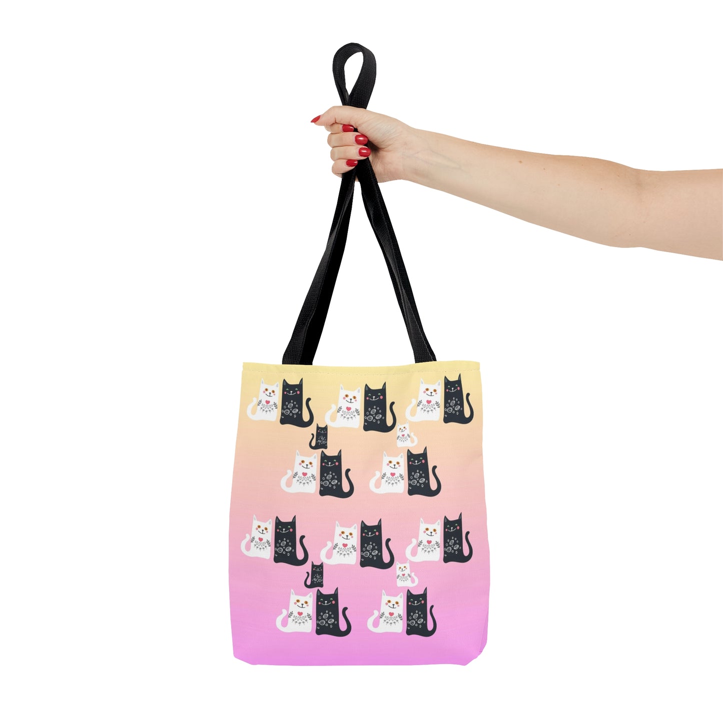 Black and White Cartoon cats design on a pink and yellow colored tote bag