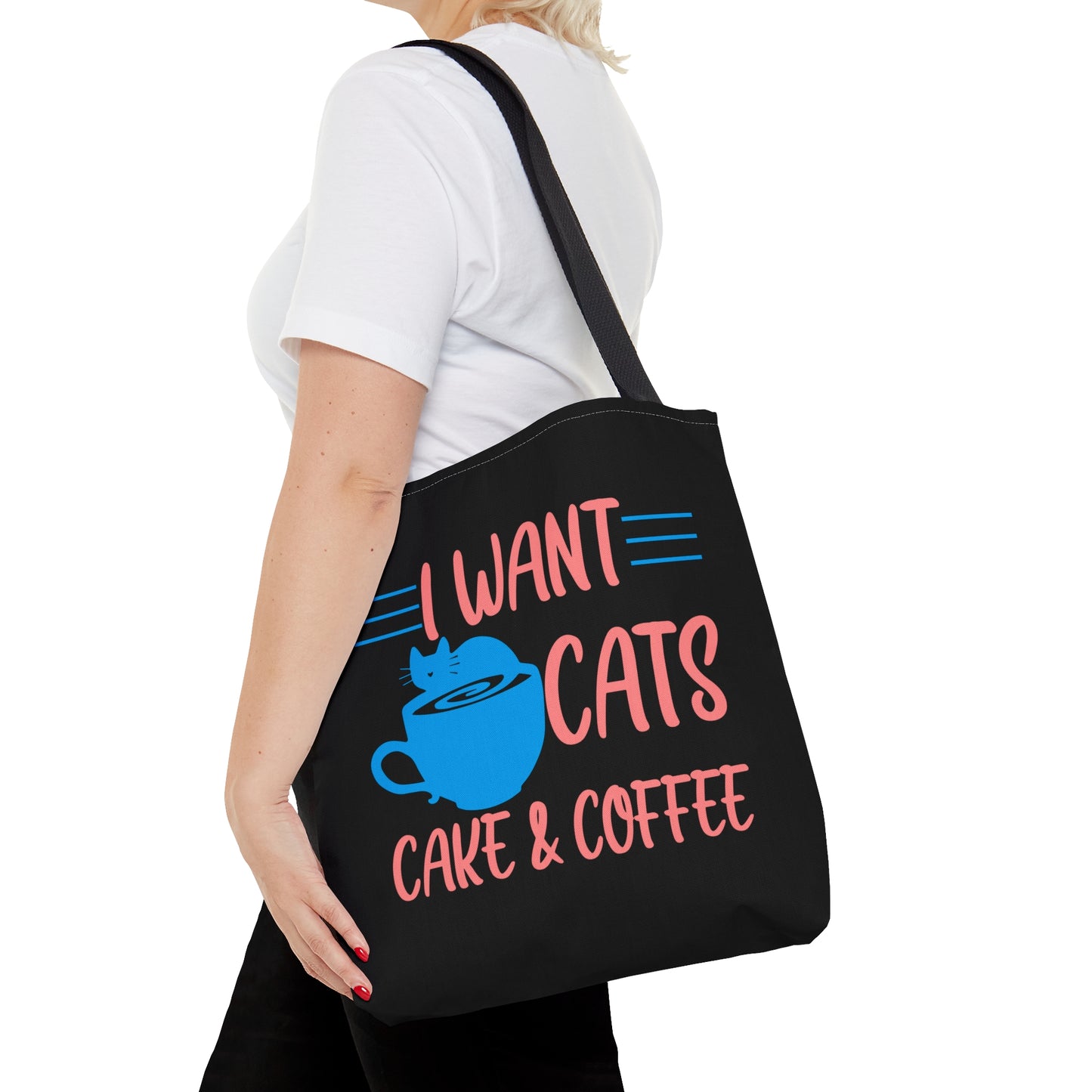 Black tote bag with 'I Want Cats, Cake & Coffee' text and a blue cat and cup illustration
