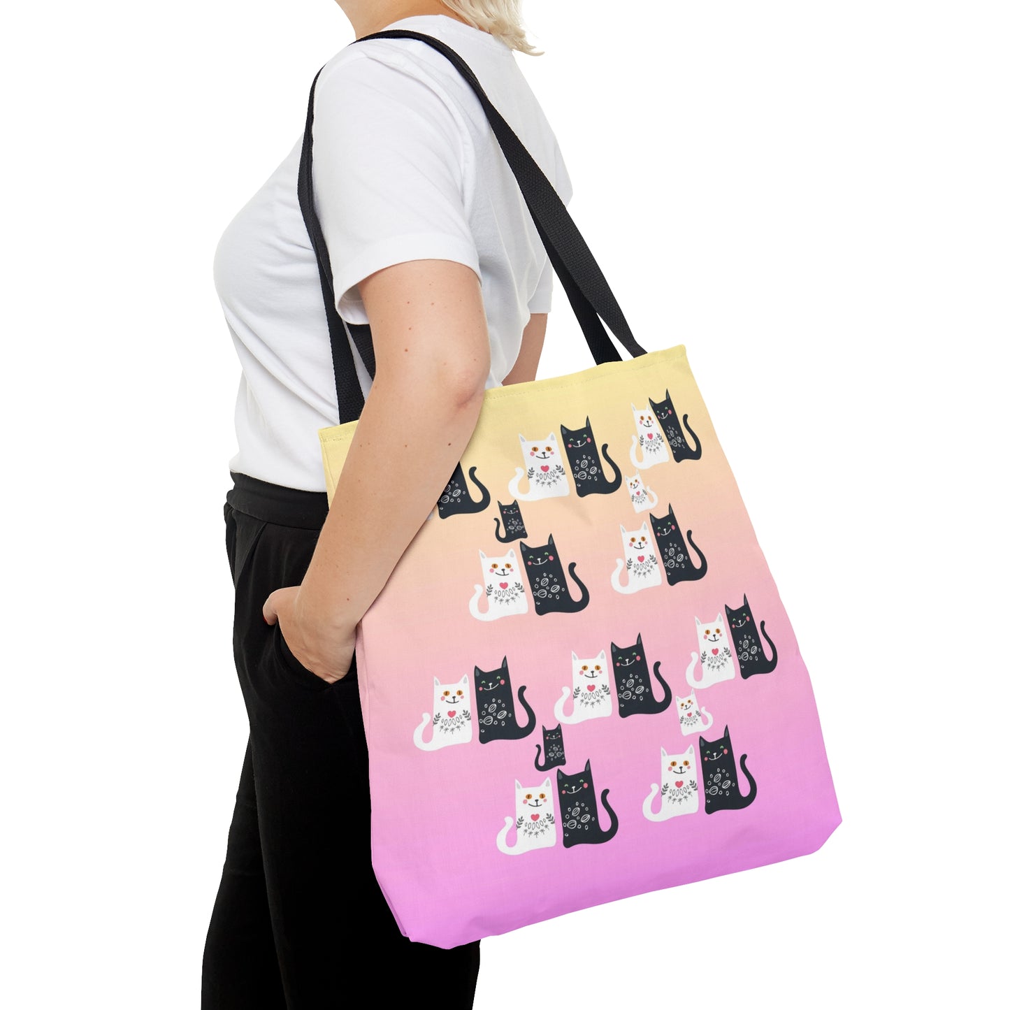 Black and White Cartoon cats design on a pink and yellow colored tote bag