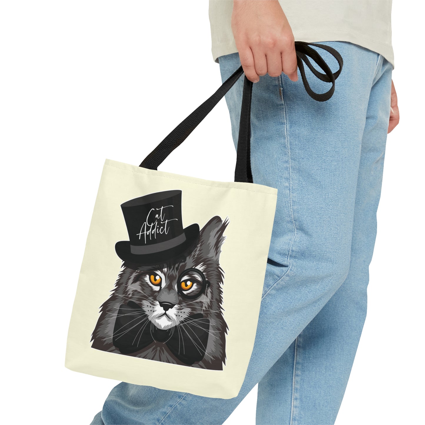 Cream Tote bag with a Maine Coon cat illustration and the text "Cat Addict."