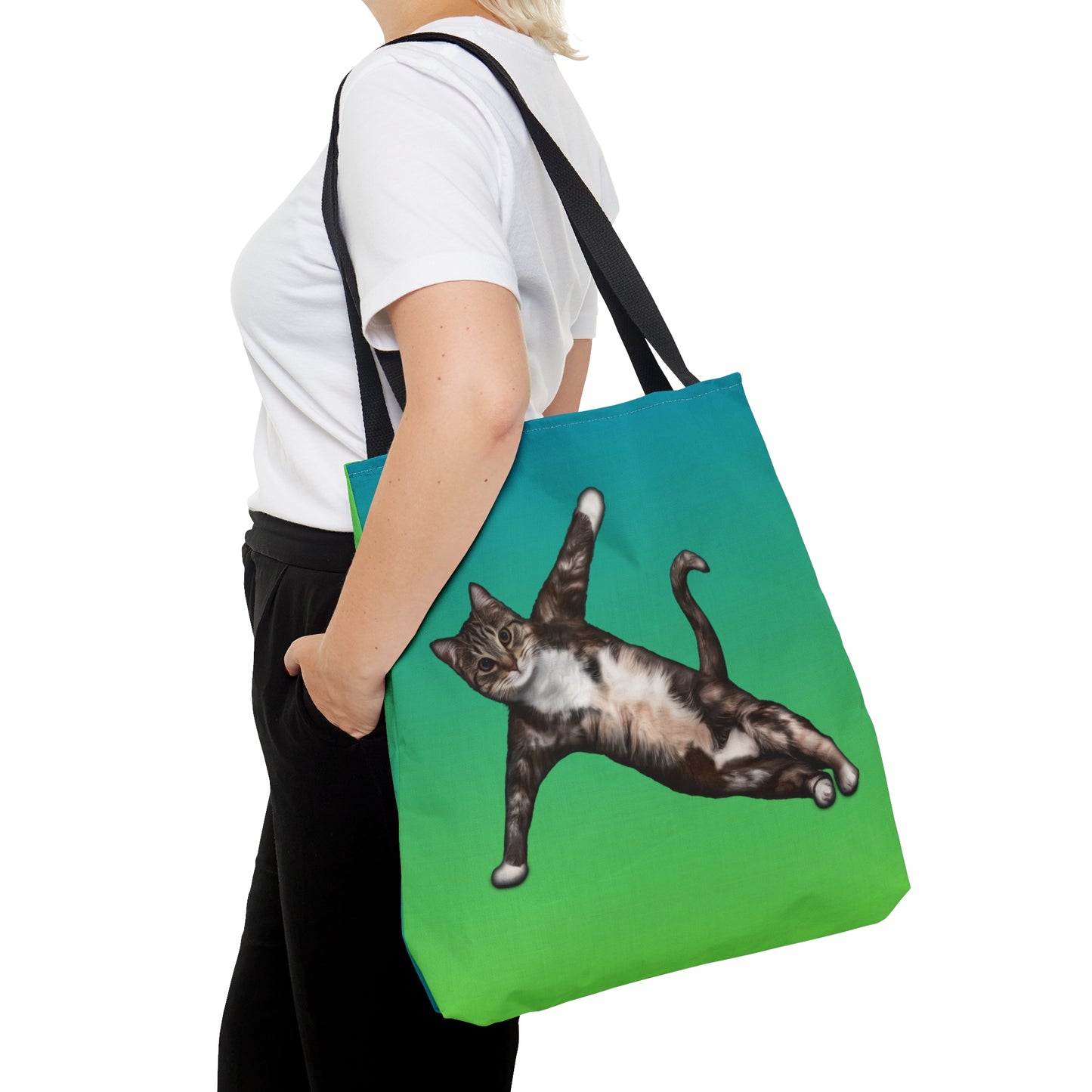 Tote bag with a cat in a yogi pose on a green gradient background
