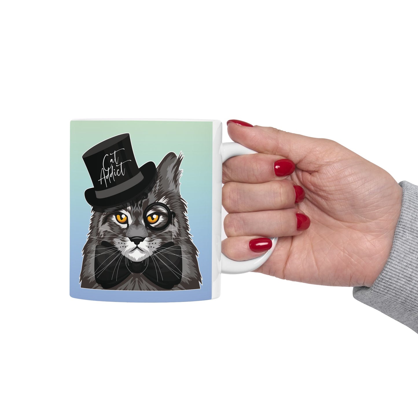 Mug with a Maine Coon cat illustration and the text 'Cat Addict.'