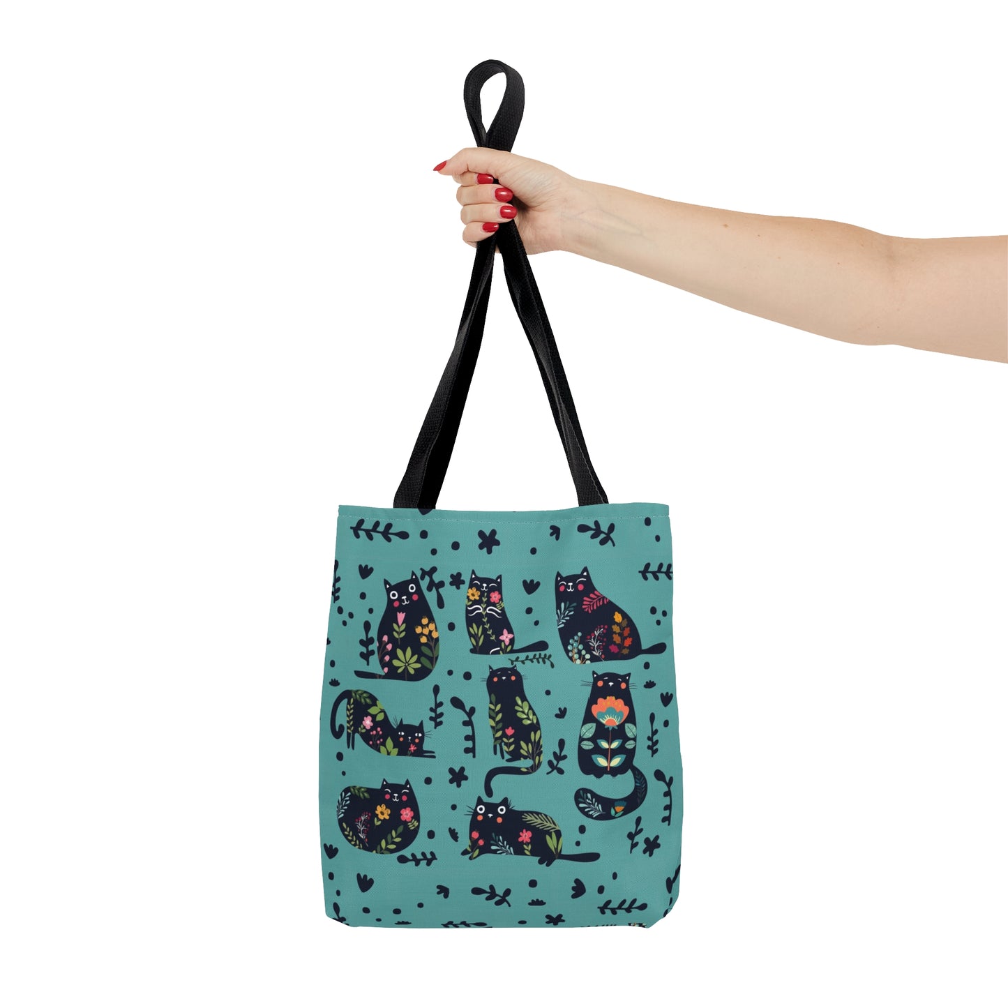 Blue Tote bag with black illustrated cats and flowers pattern.