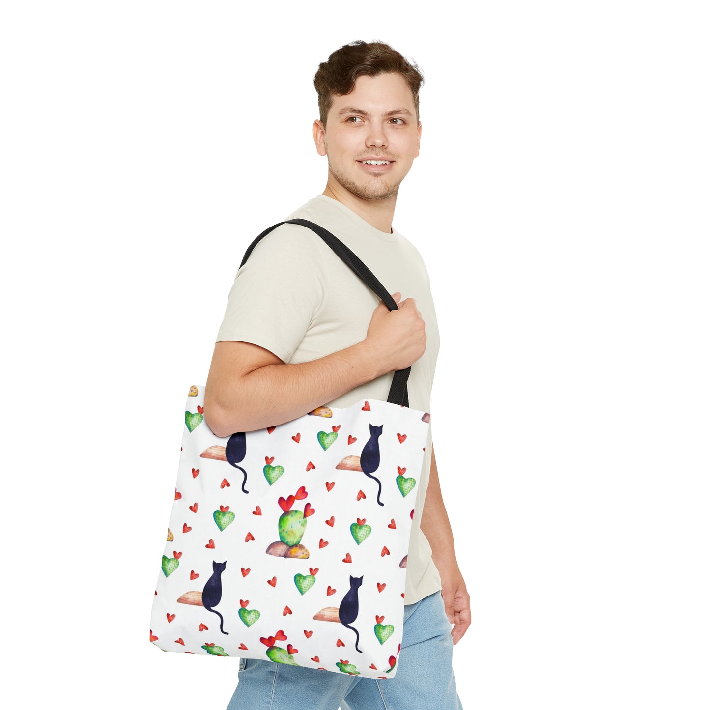 Tote bag with black cat, hearts and cactus pattern on a white background