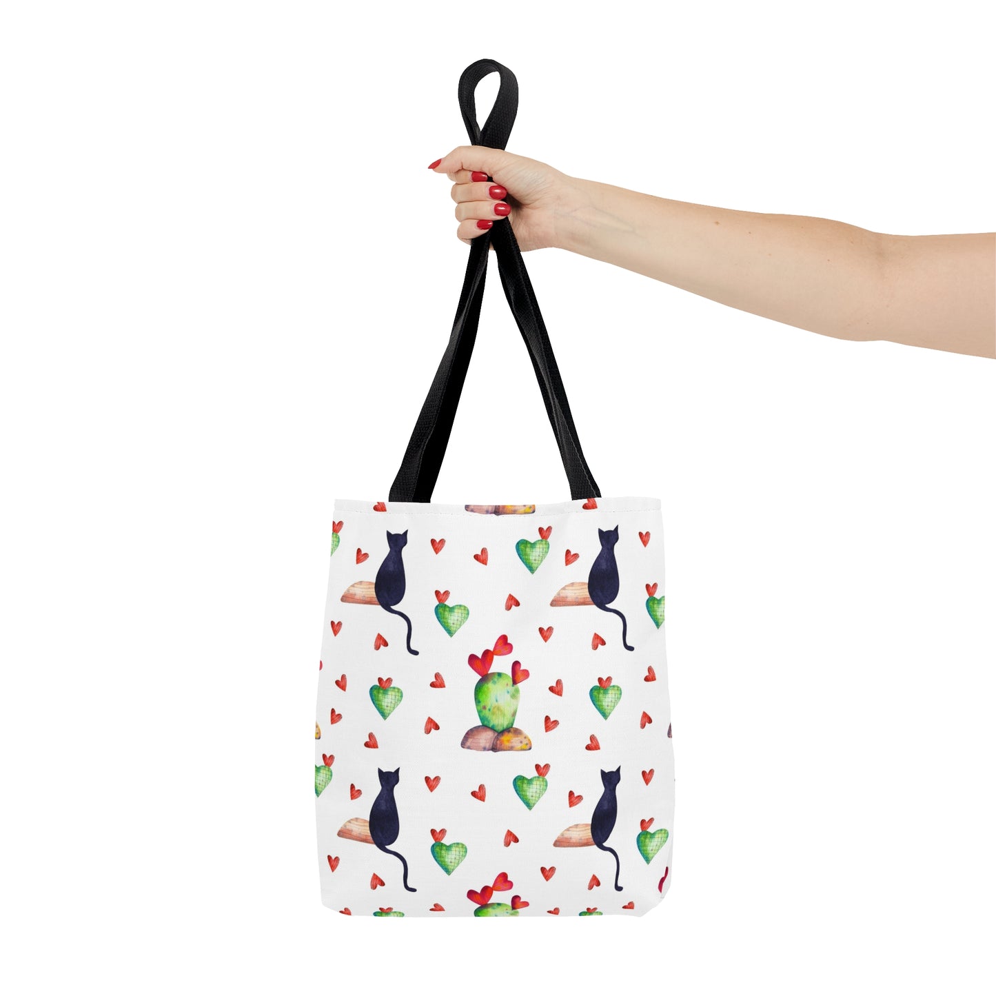 Tote bag with black cat, hearts and cactus pattern on a white background