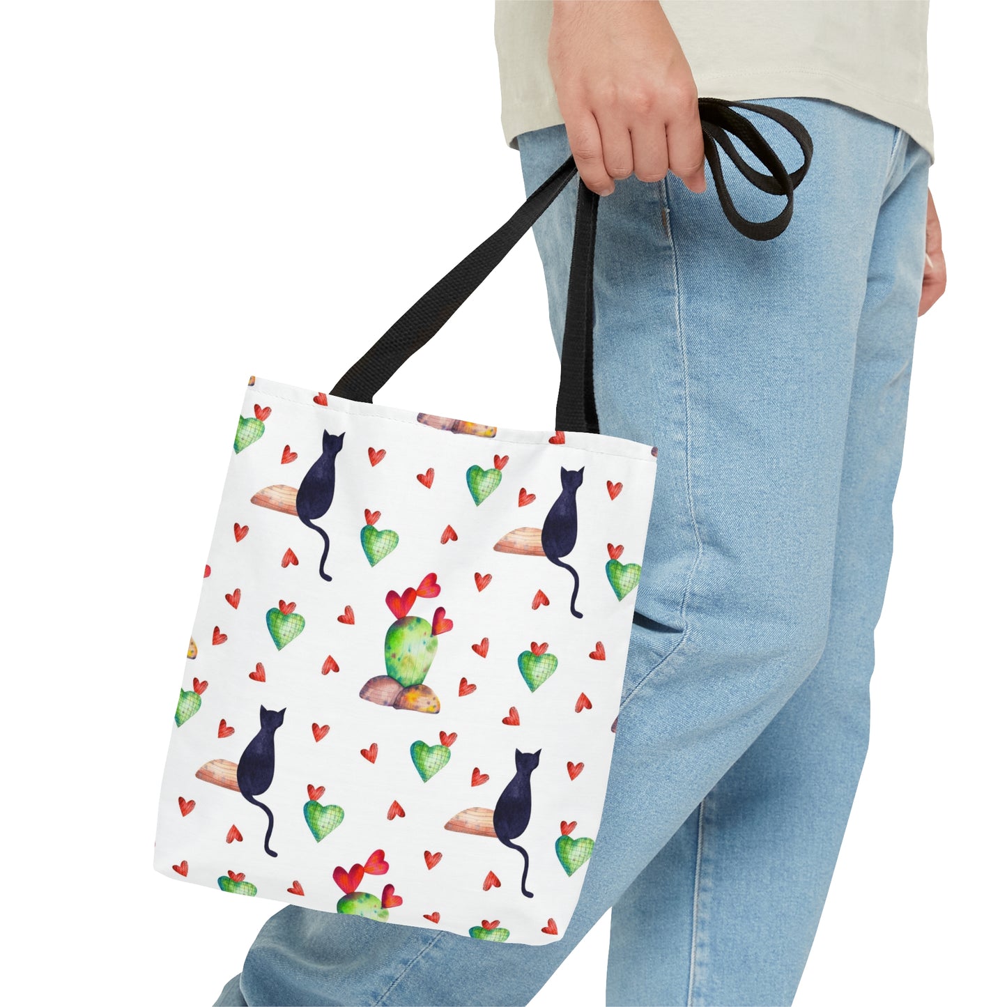 Tote bag with black cat, hearts and cactus pattern on a white background
