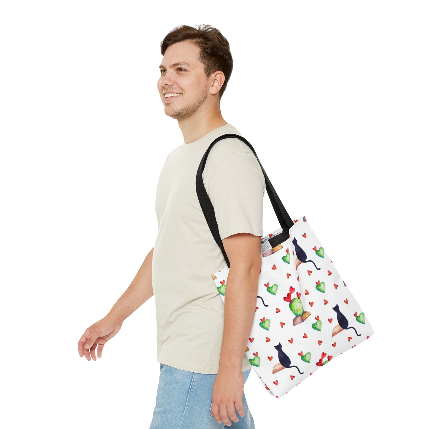 Tote bag with black cat, hearts and cactus pattern on a white background