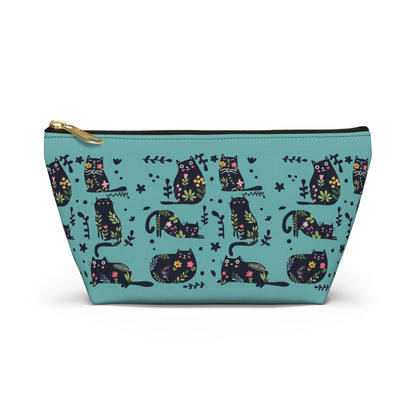 An accessory bag with an abstract design featuring cats and floral design on a blue background. Cosmetic, makeup, toiletry, travel, pencil case & everyday bag for cat lovers.