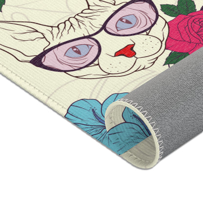 Area rug with a pattern of cartoon Sphynx cats and tropical flowers on a cream background