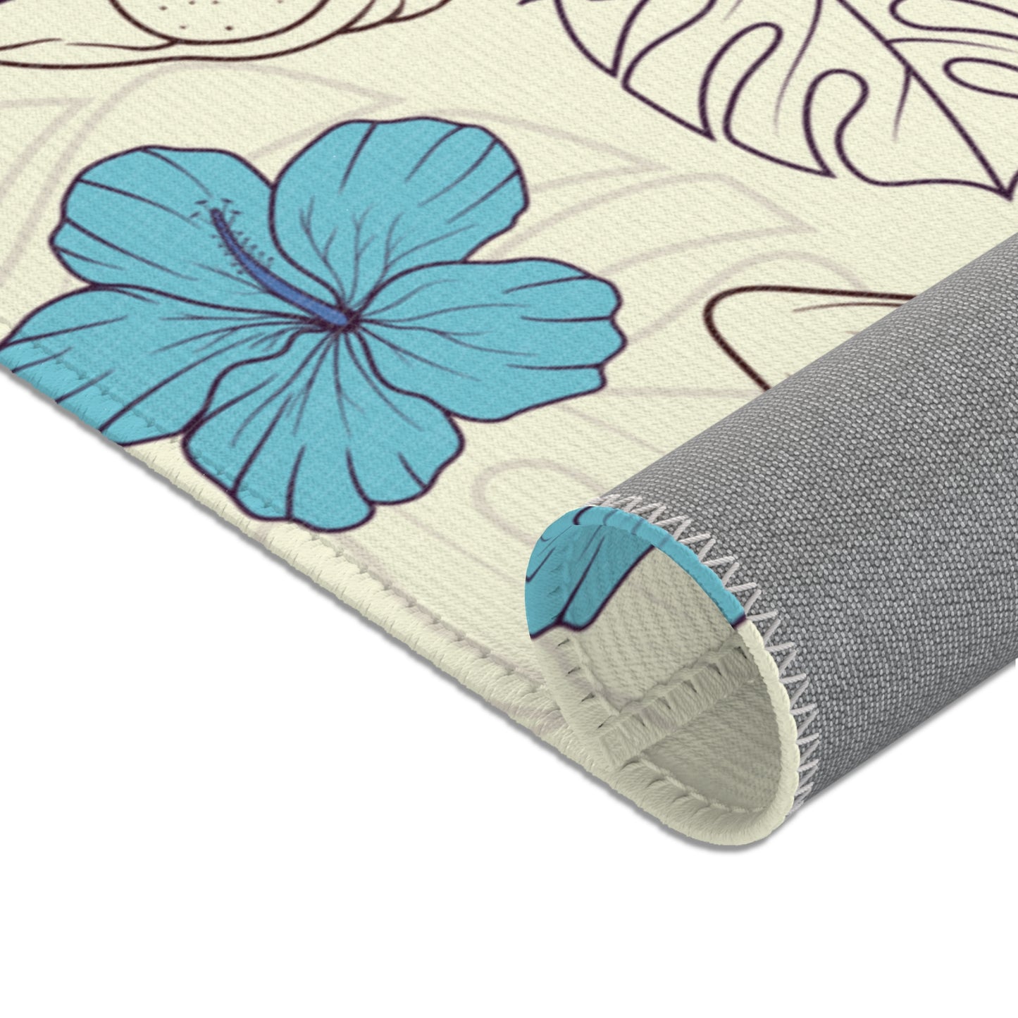 Area rug with a pattern of cartoon Sphynx cats and tropical flowers on a cream background
