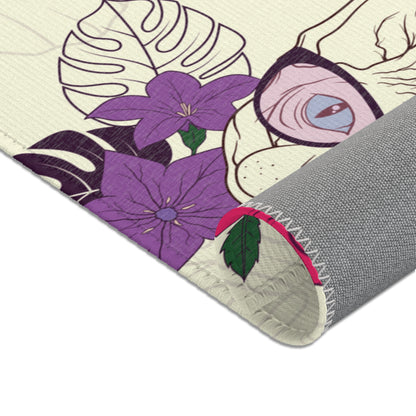 Area rug with a pattern of cartoon Sphynx cats and tropical flowers on a cream background