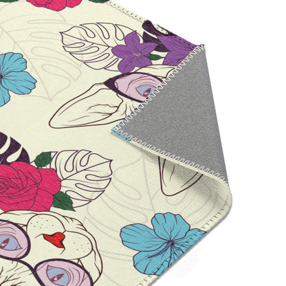 Area rug with a pattern of cartoon Sphynx cats and tropical flowers on a cream background