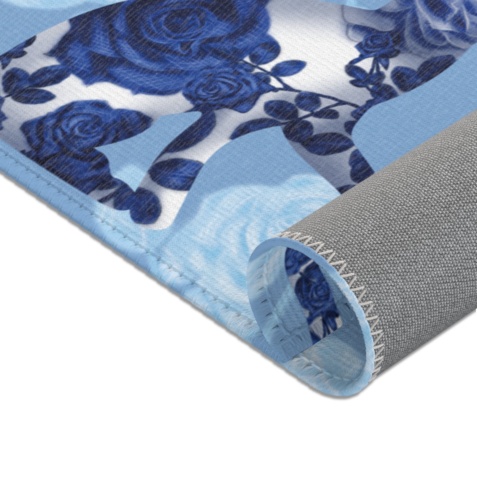 Area rug with cats, butterflies & roses motif on a blue background