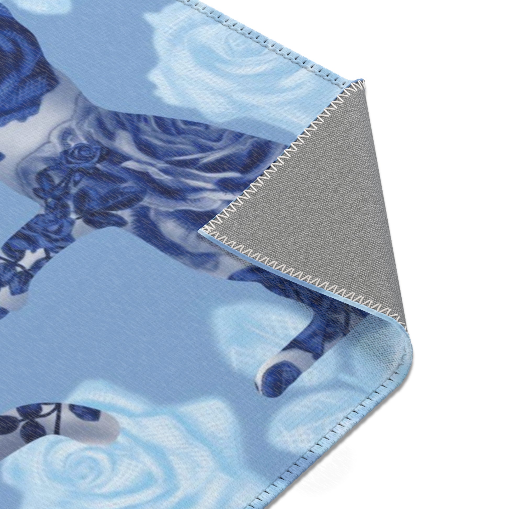 Area rug with cats, butterflies & roses motif on a blue background