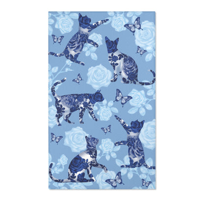 Area rug with cats, butterflies & roses motif on a blue background