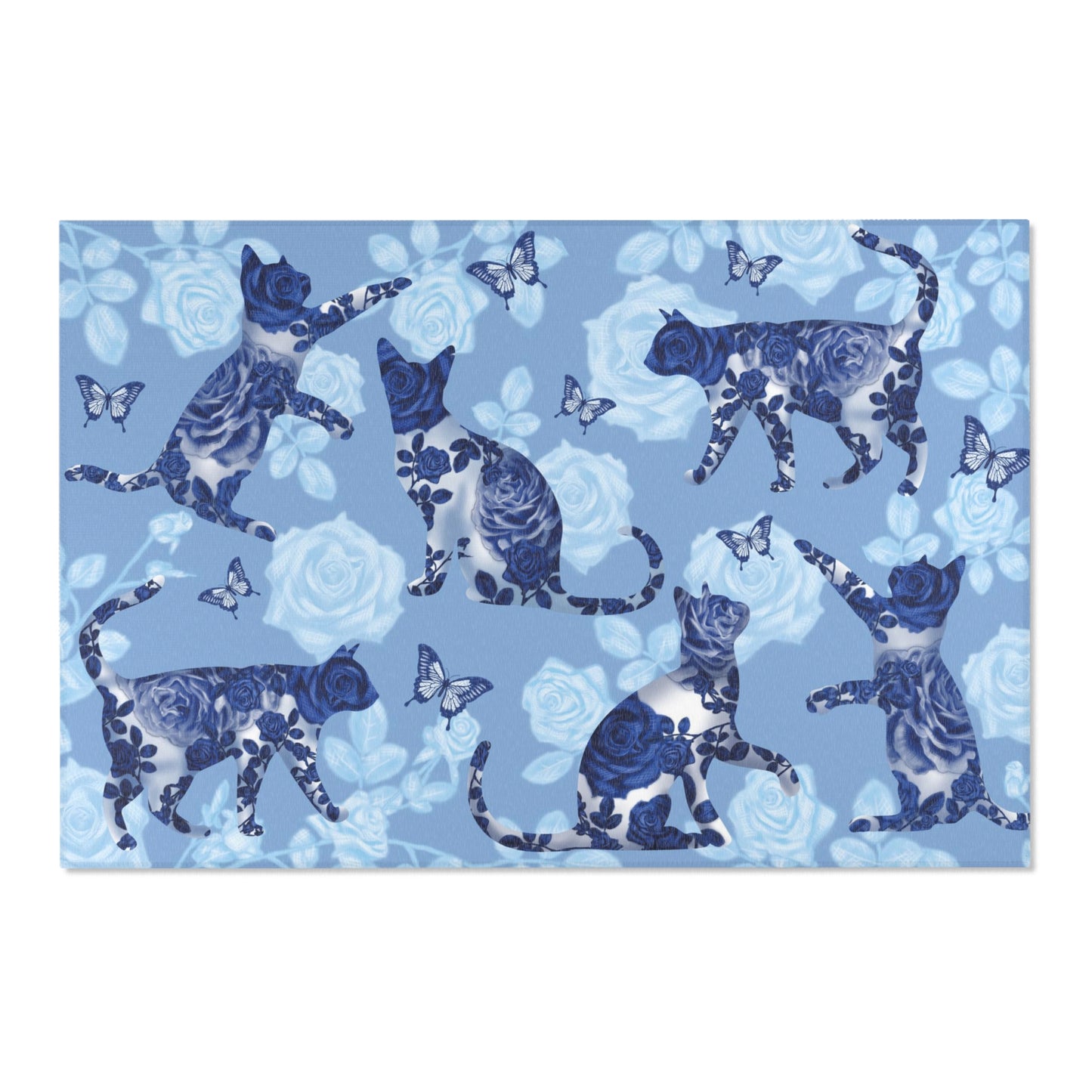 Area rug with cats, butterflies & roses motif on a blue background