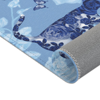Area rug with cats, butterflies & roses motif on a blue background