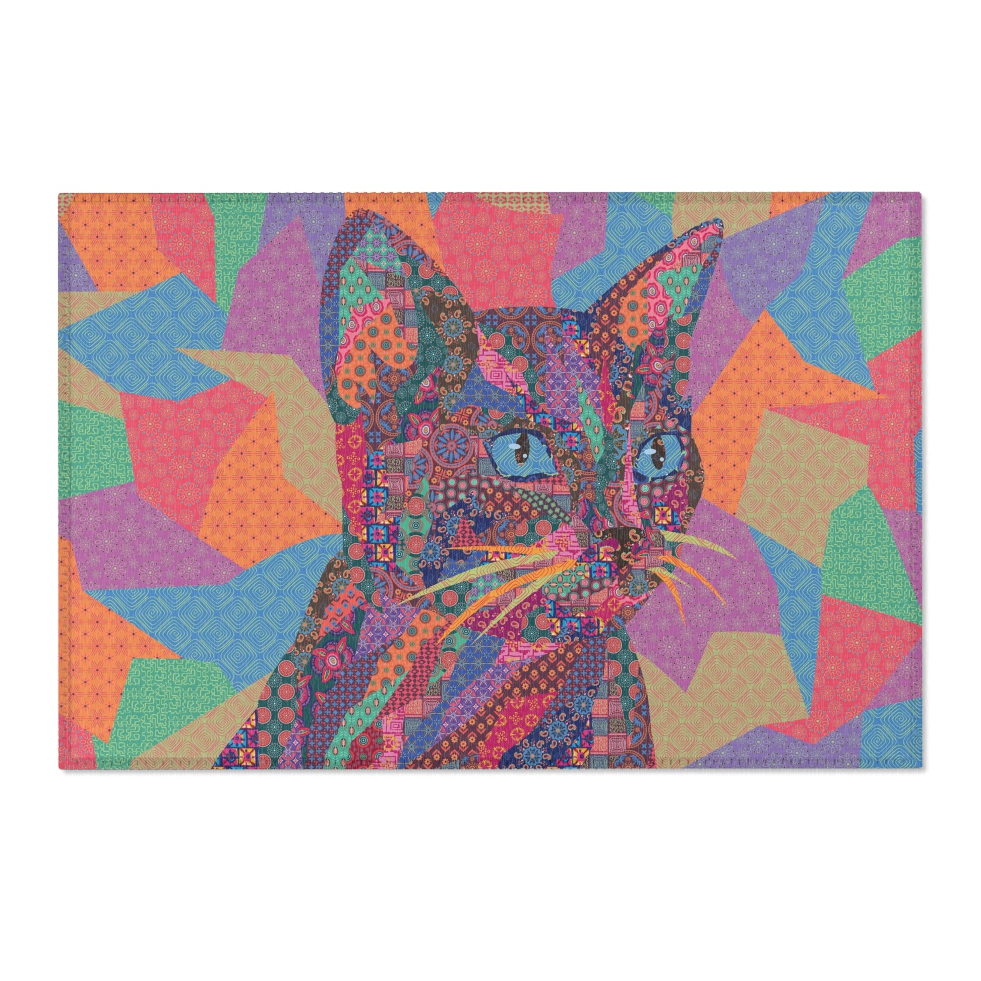 Area rug with colorful abstract cat design on a geometric patterned background
