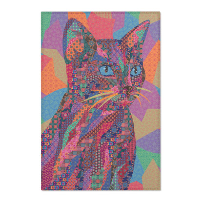 Area rug with colorful abstract cat design on a geometric patterned background