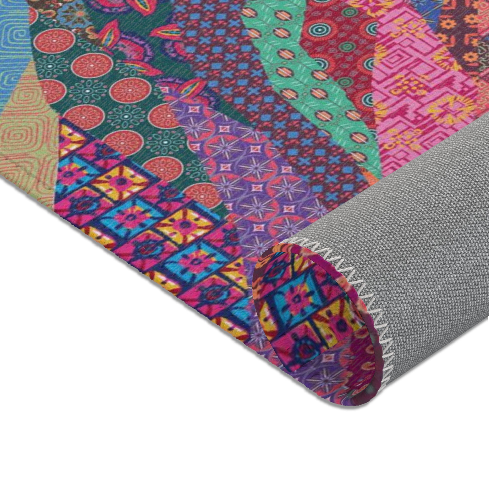 Area rug with colorful abstract cat design on a geometric patterned background