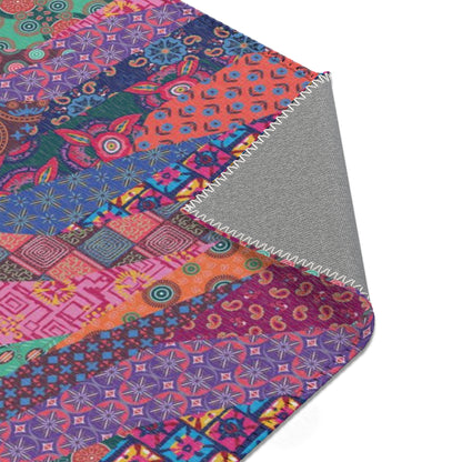 Area rug with colorful abstract cat design on a geometric patterned background