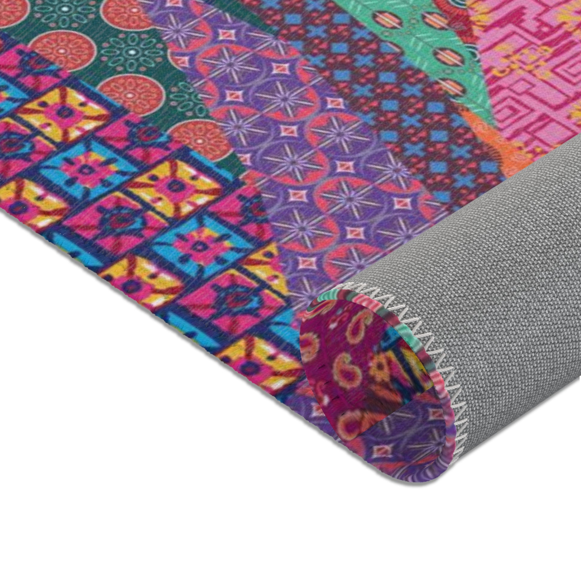 Area rug with colorful abstract cat design on a geometric patterned background