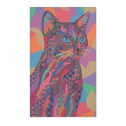 Area rug with colorful abstract cat design on a geometric patterned background