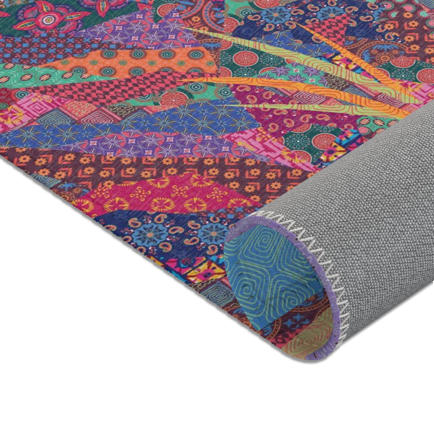 Area rug with colorful abstract cat design on a geometric patterned background