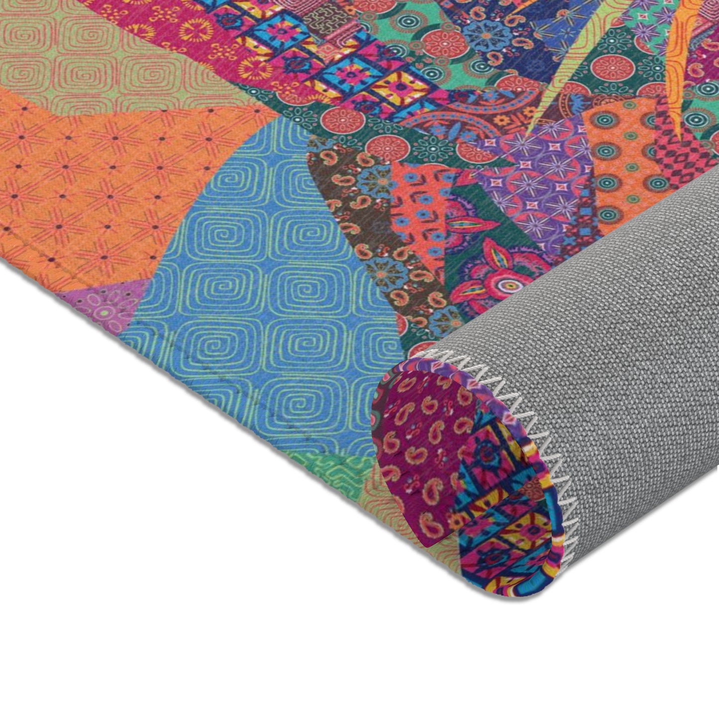 Area rug with colorful abstract cat design on a geometric patterned background