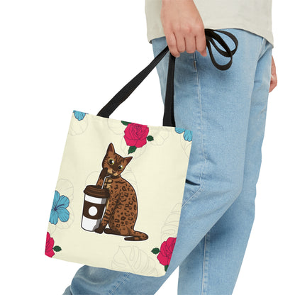 Cream Tote Bag Of A Cartoon Bengal Cat Drinking Through A Straw And Flowers Design