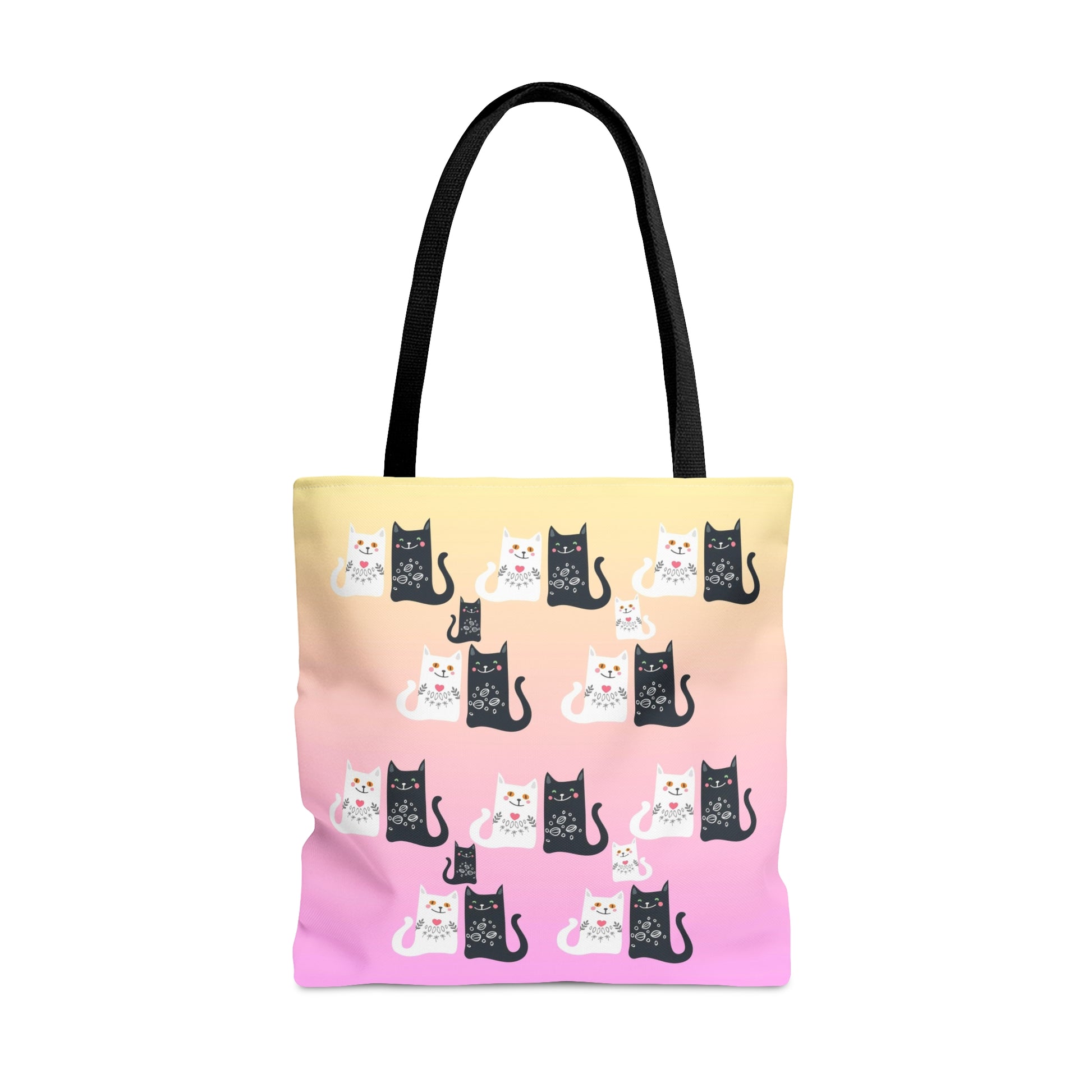 Black and White Cartoon cats design on a pink and yellow colored tote bag