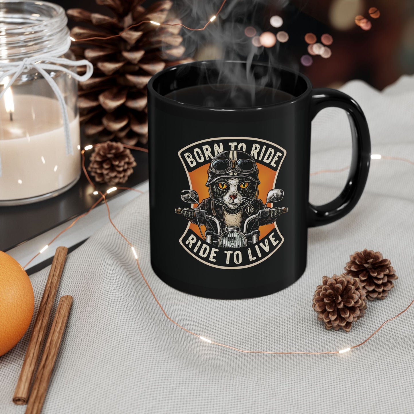 Black mug with a cat on a motorcycle graphic and 'Born to Ride, Ride to Live' text  