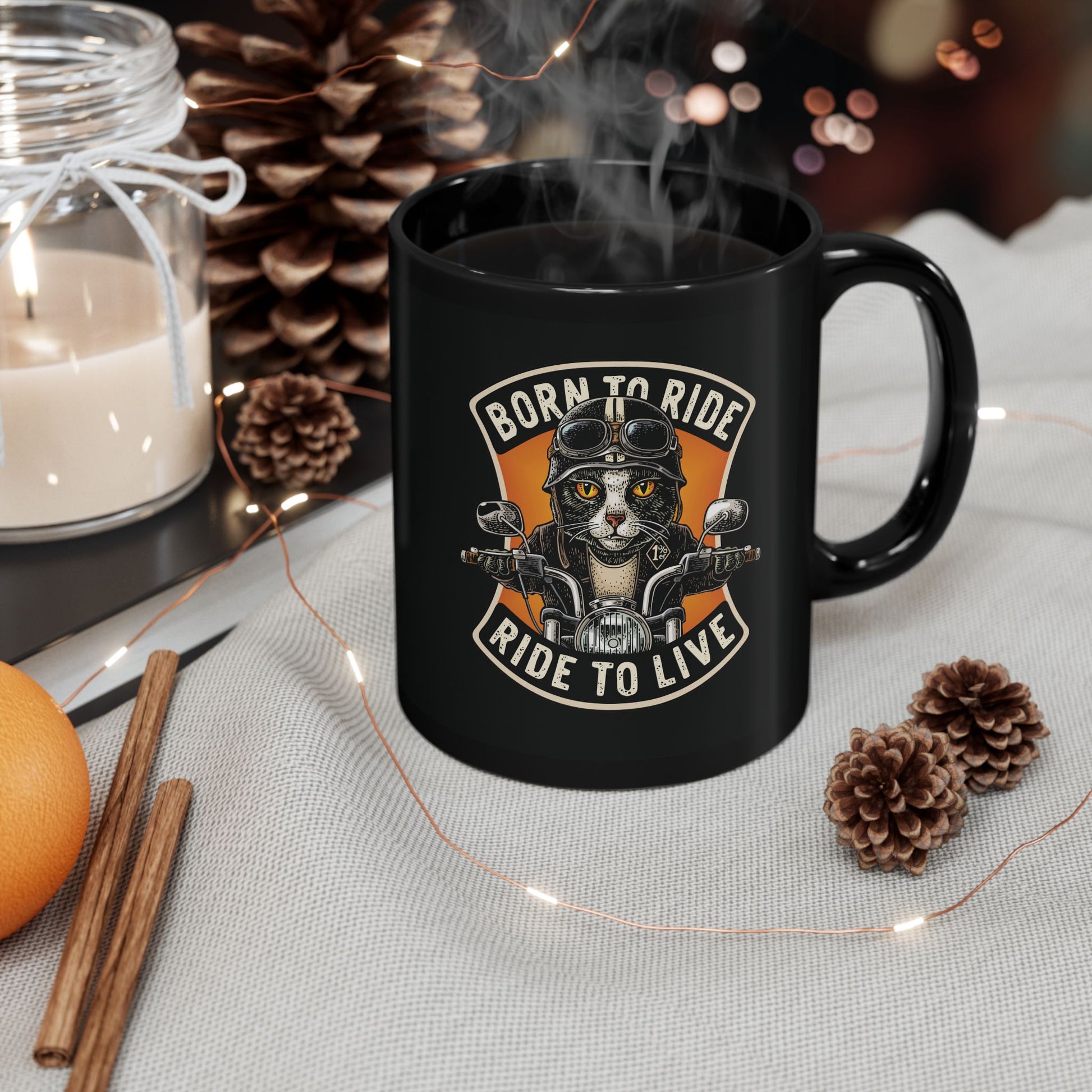 Black mug with a cat on a motorcycle graphic and 'Born to Ride, Ride to Live' text  