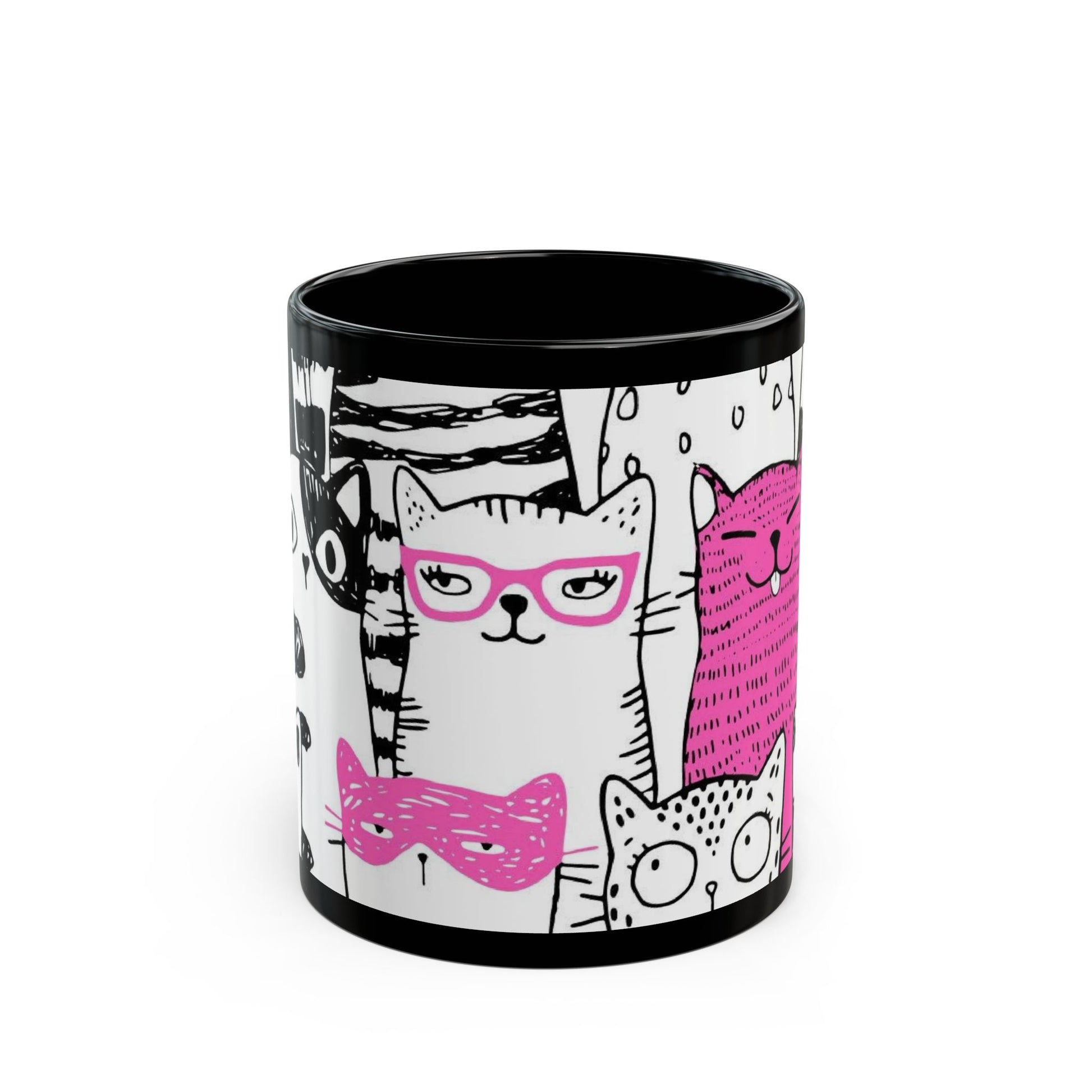 Black mug with cartoon cat illustrations.