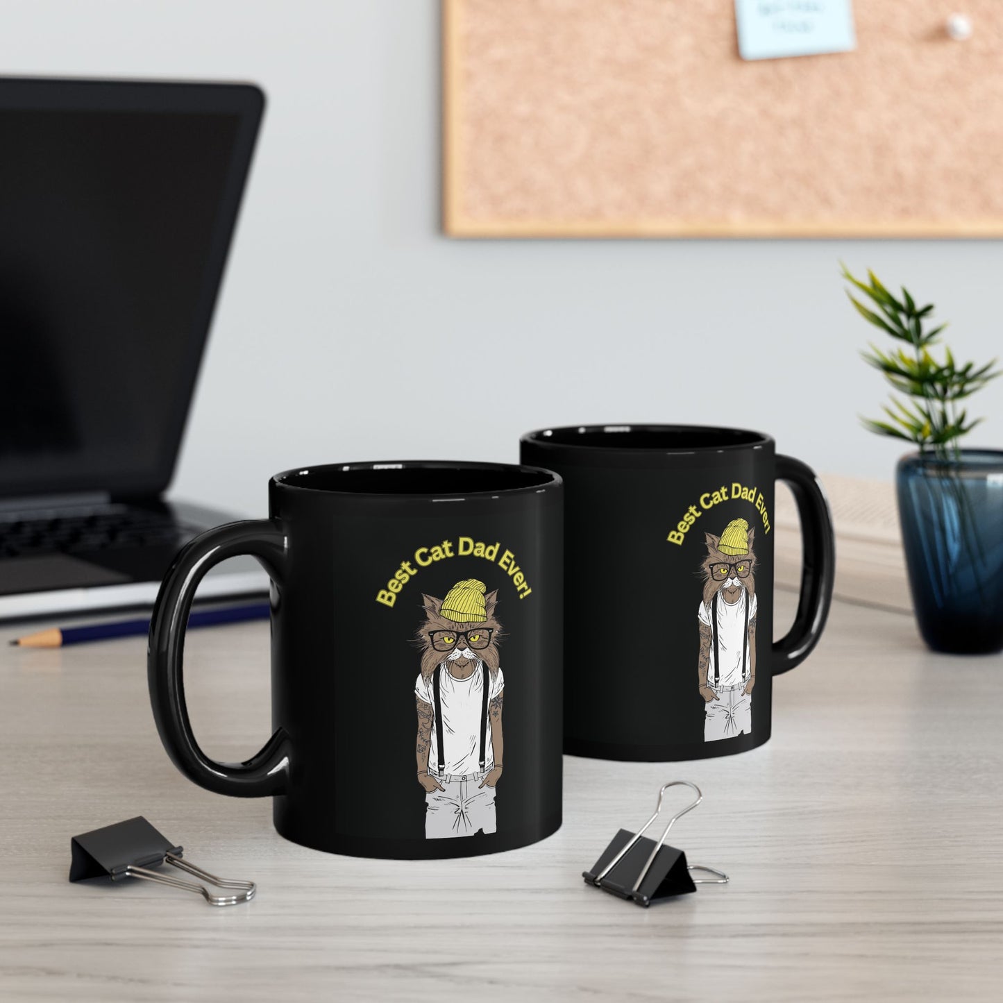 Black mug with a cat illustration and 'Best Cat Dad Ever!' text.