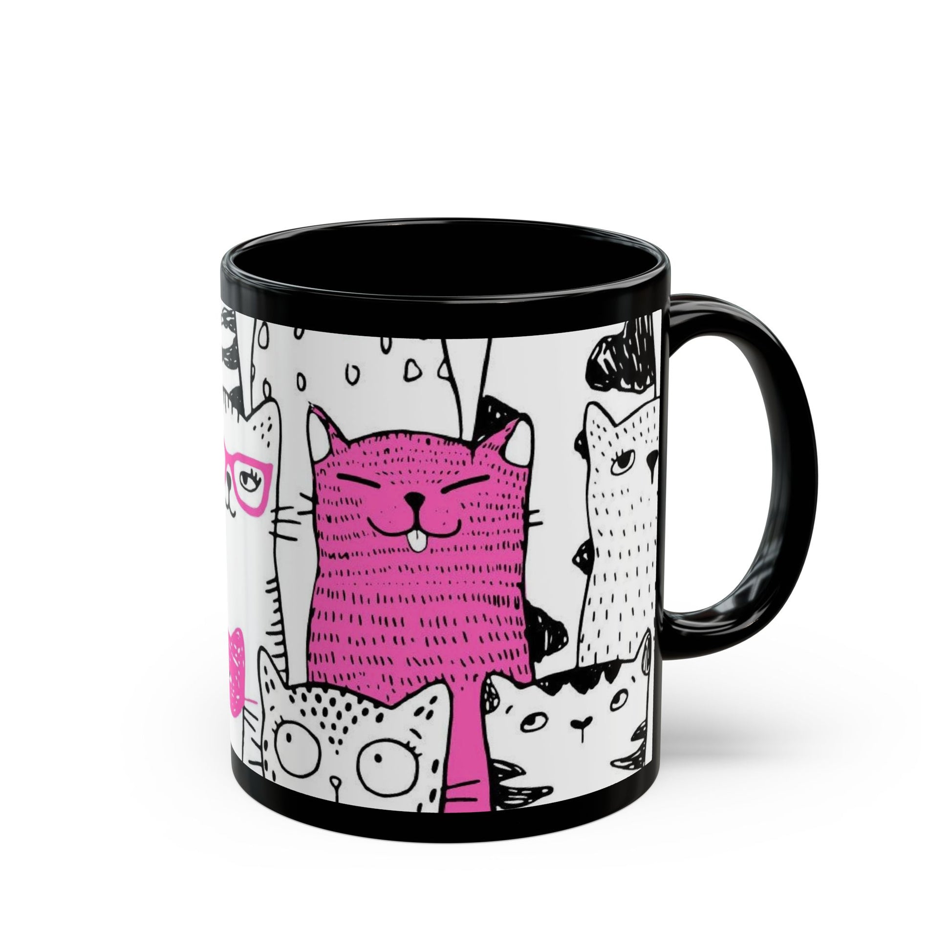 Black mug with cartoon cat illustrations.