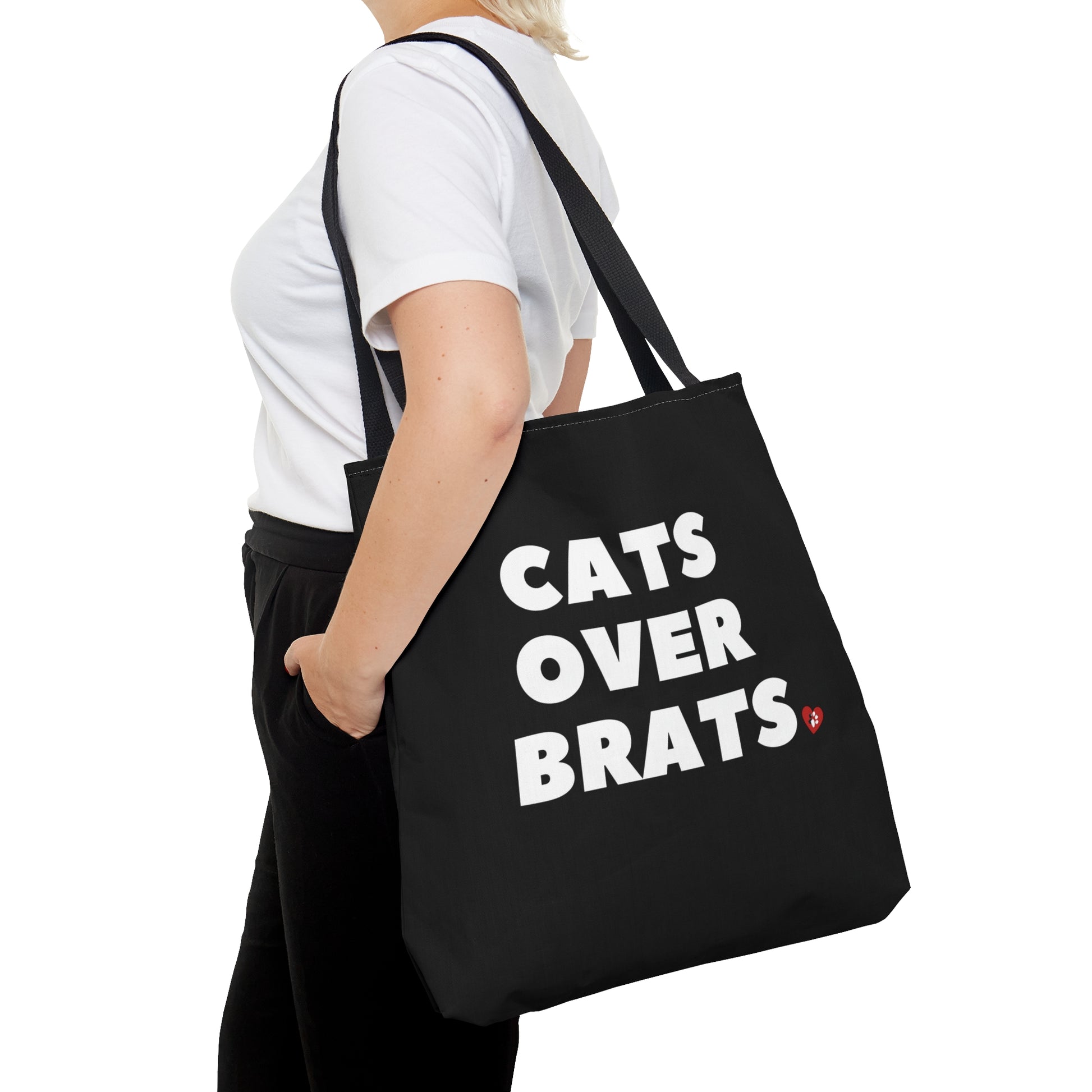 Black tote bag with 'Cats Over Brats' text  