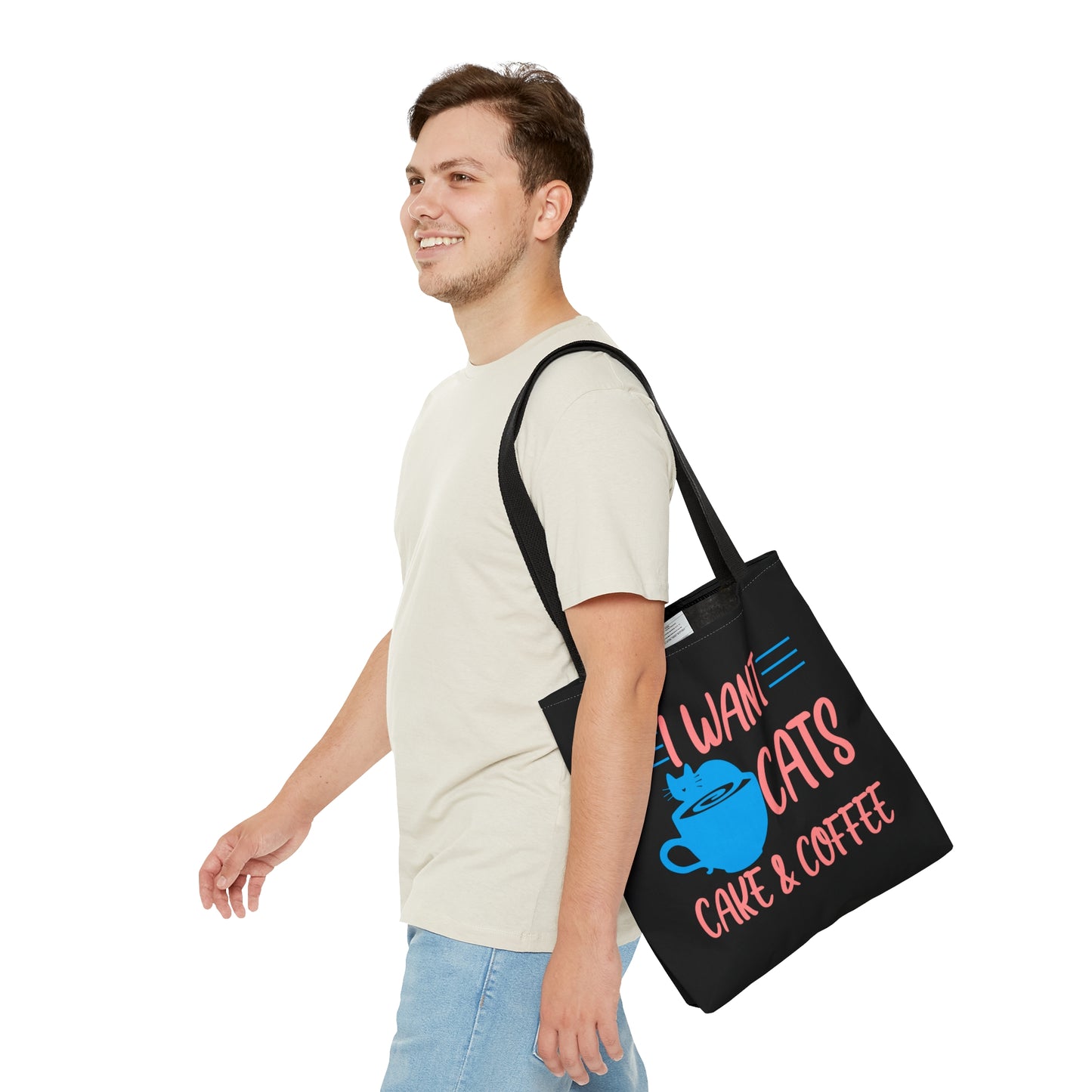 Black tote bag with 'I Want Cats, Cake & Coffee' text and a blue cat and cup illustration