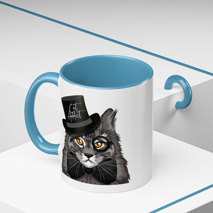 Mug with an illustration of a Maine Coon cat wearing a top hat and the text 'Cat Addict' 