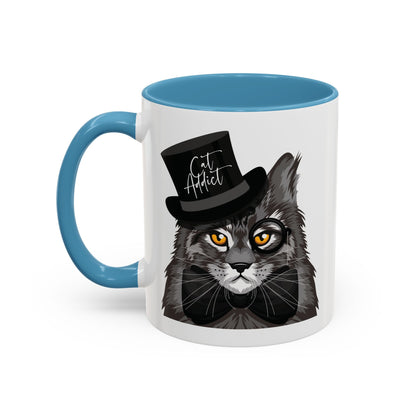 Mug with an illustration of a Maine Coon cat wearing a top hat and the text 'Cat Addict' 