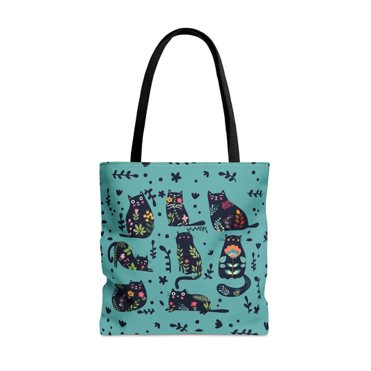 Blue Tote bag with black illustrated cats and flowers pattern.