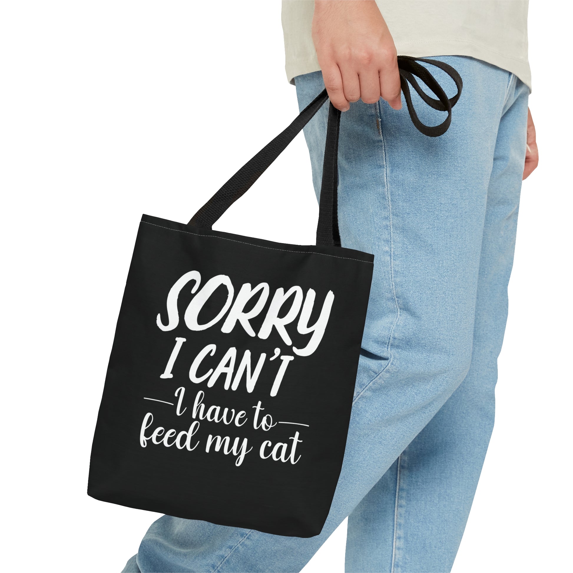 "Sorry I can't i have to feed my cat" black tote bag