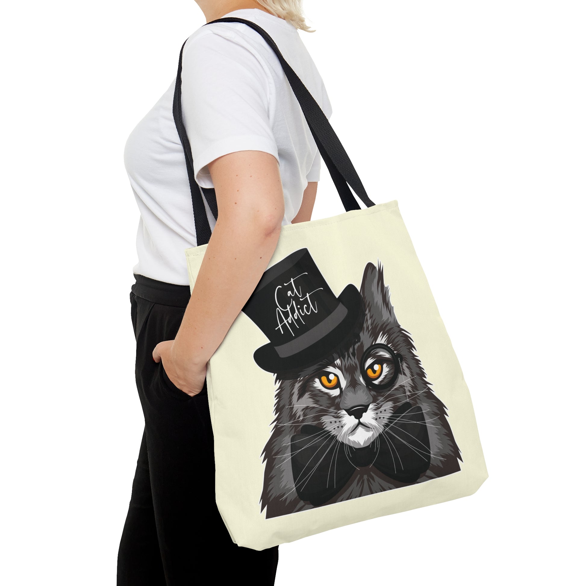 Cream Tote bag with a Maine Coon cat illustration and the text "Cat Addict." 