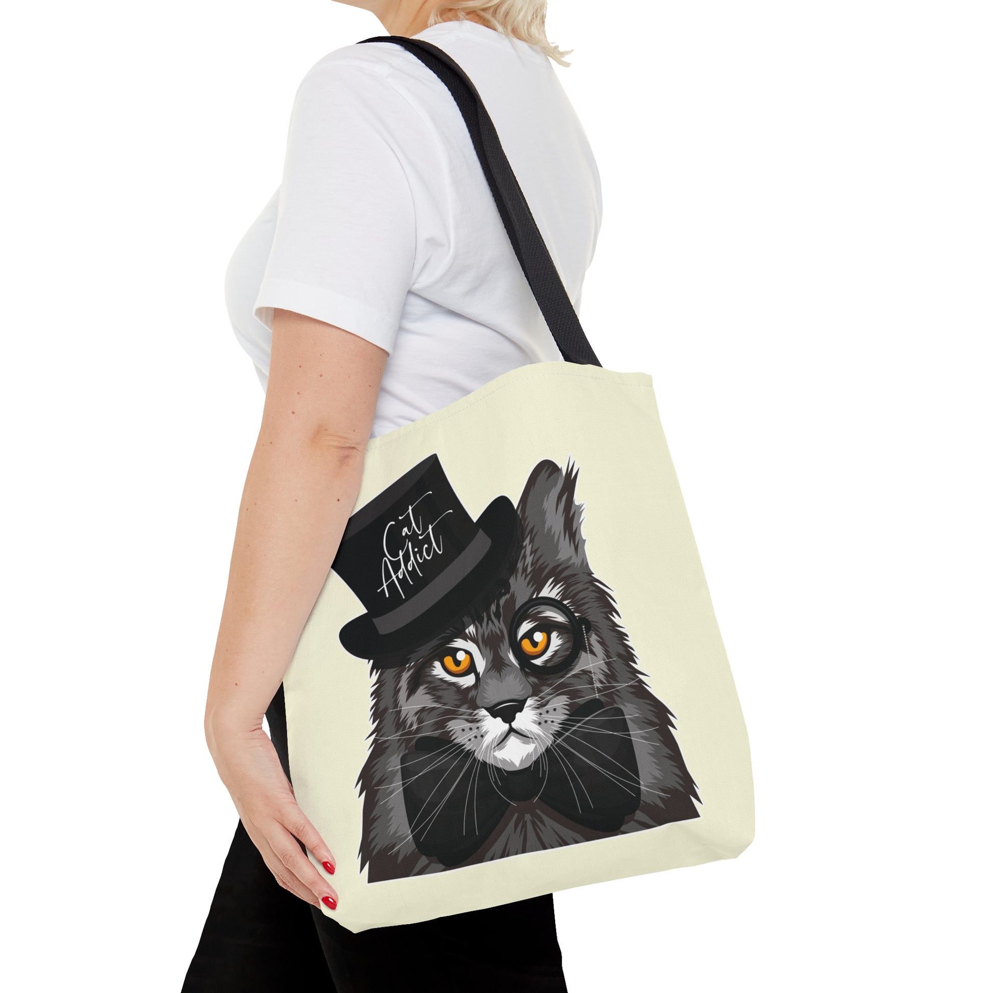Cream Tote bag with a Maine Coon cat illustration and the text "Cat Addict." 