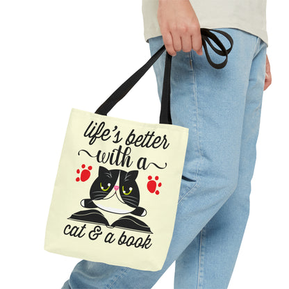 Cream Tote bag with a cat illustration and text 'life's better with a cat & a book'  