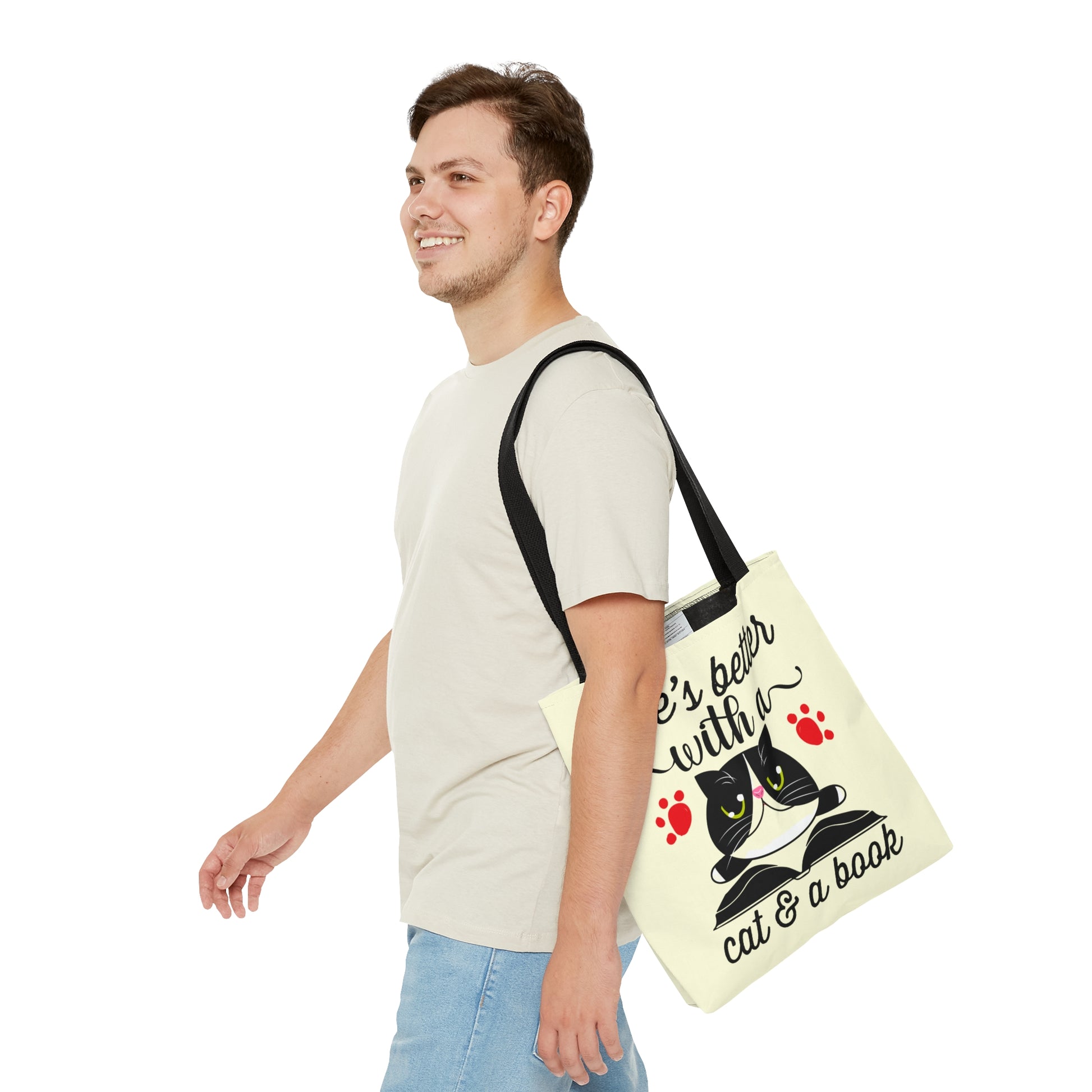 Cream Tote bag with a cat illustration and text 'life's better with a cat & a book'  