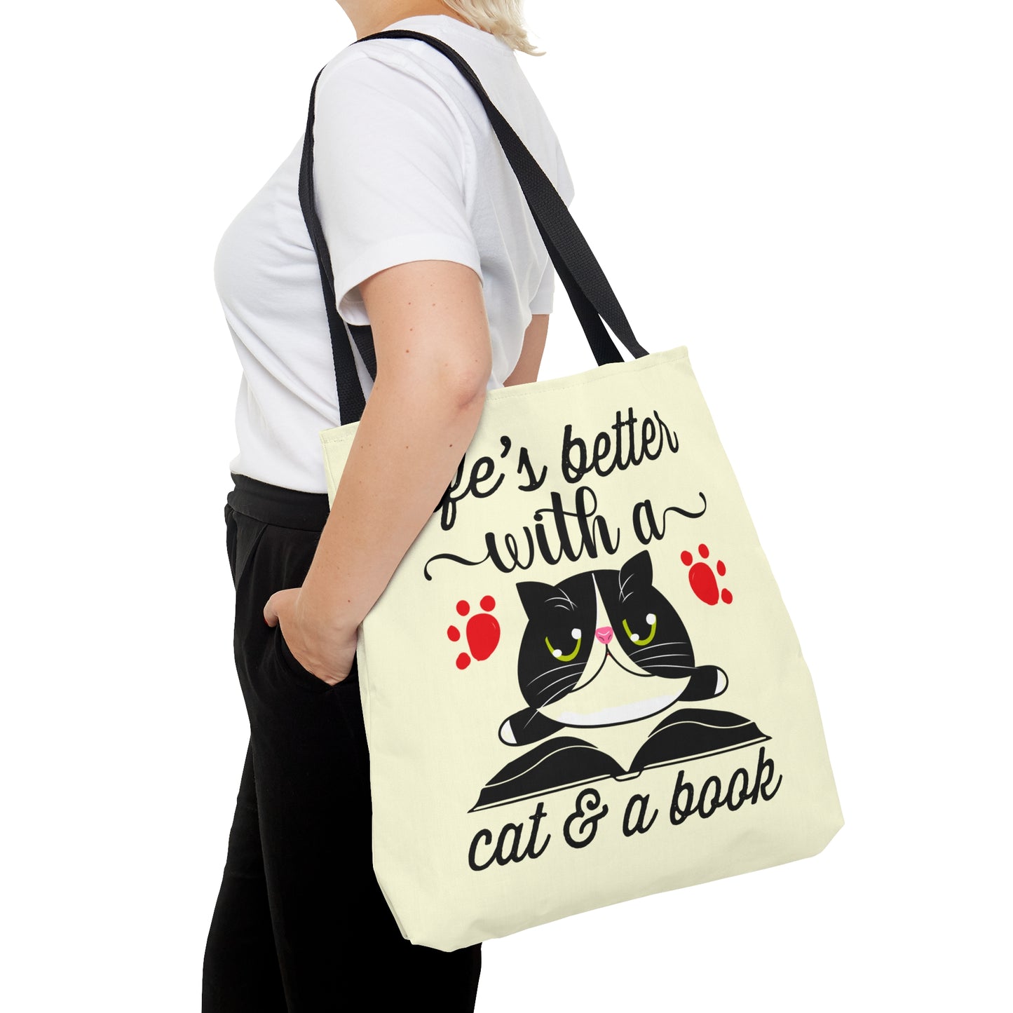 Cream Tote bag with a cat illustration and text 'life's better with a cat & a book'  