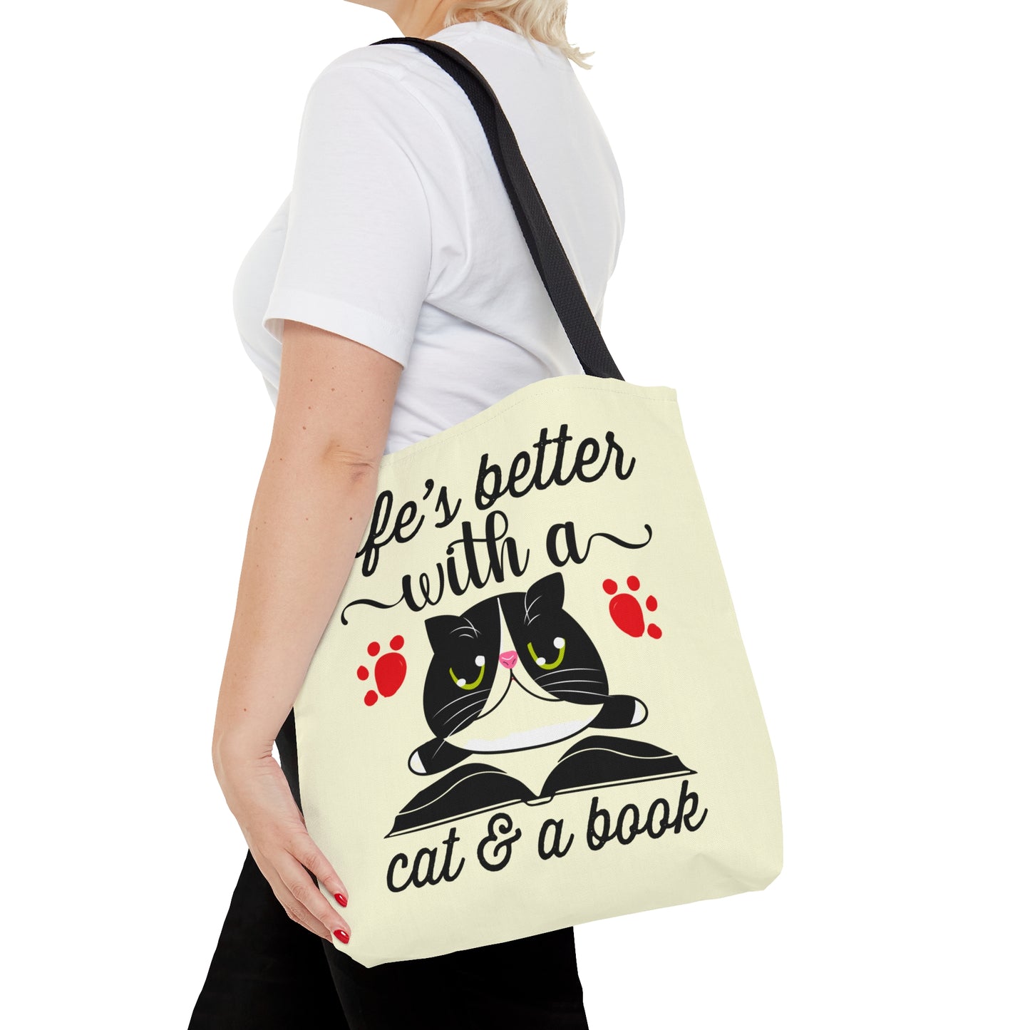 Cream Tote bag with a cat illustration and text 'life's better with a cat & a book'  